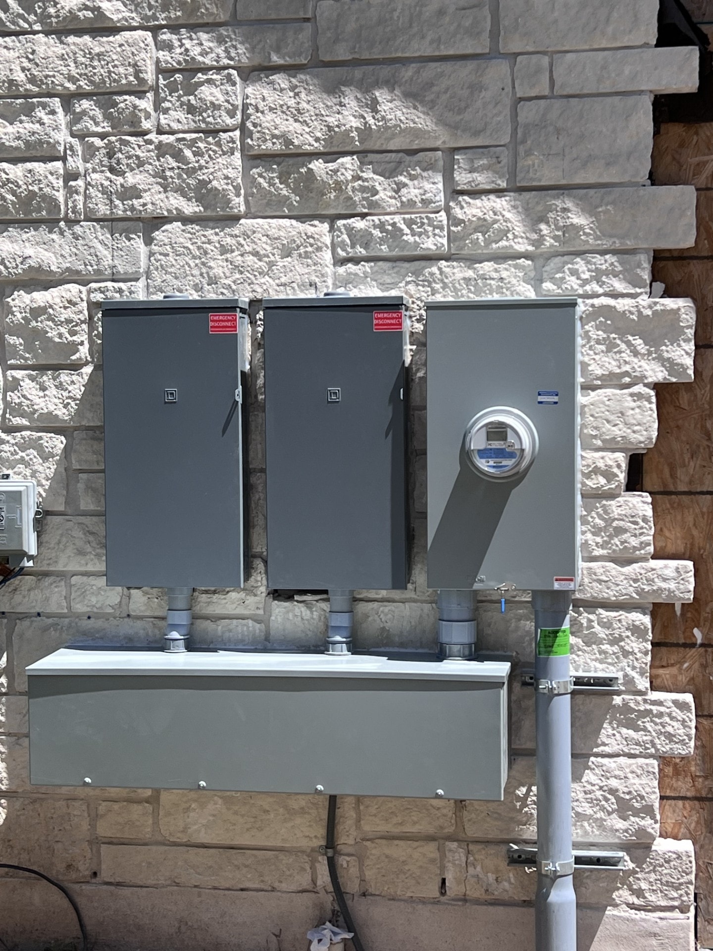 Electrical meters on stone wall